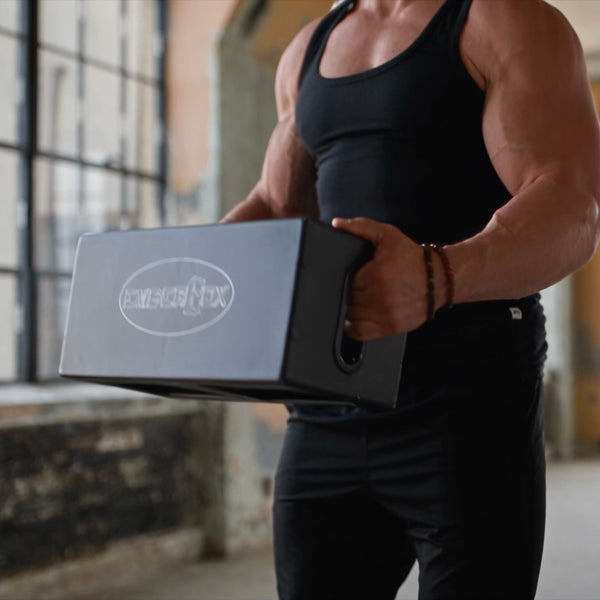 Carrying an EmberBox at the hip by its side handle.