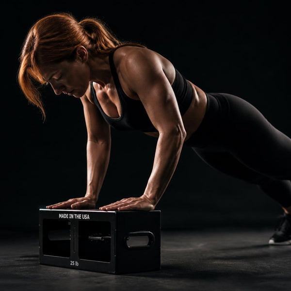 Incline push-ups with both hands on an EmberBox.